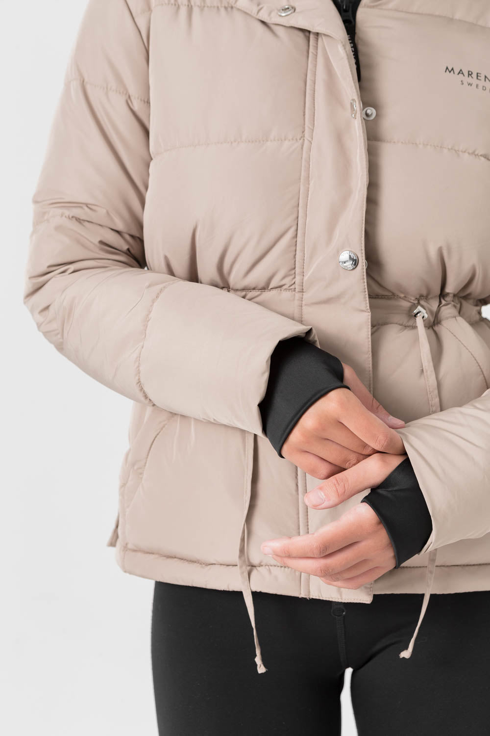 Beige padded jacket arm cuffs