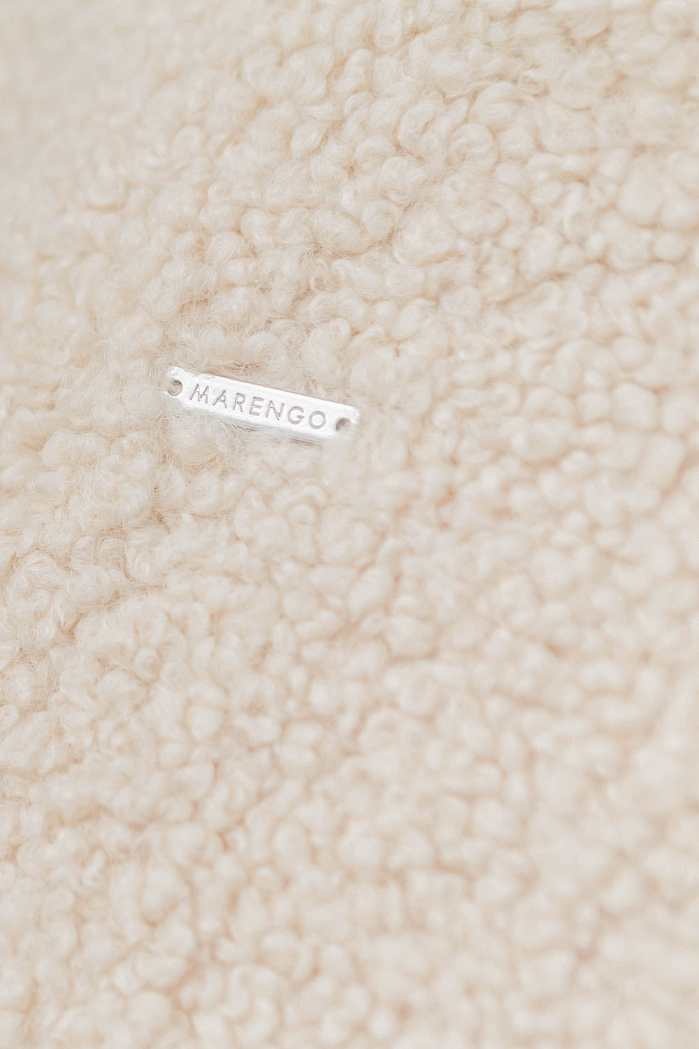 Beige pile jacket logo detail