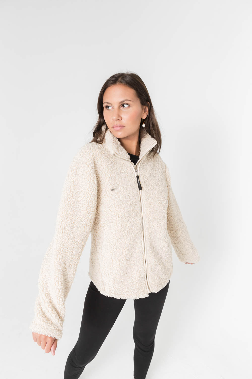 Beige pile jacket pose