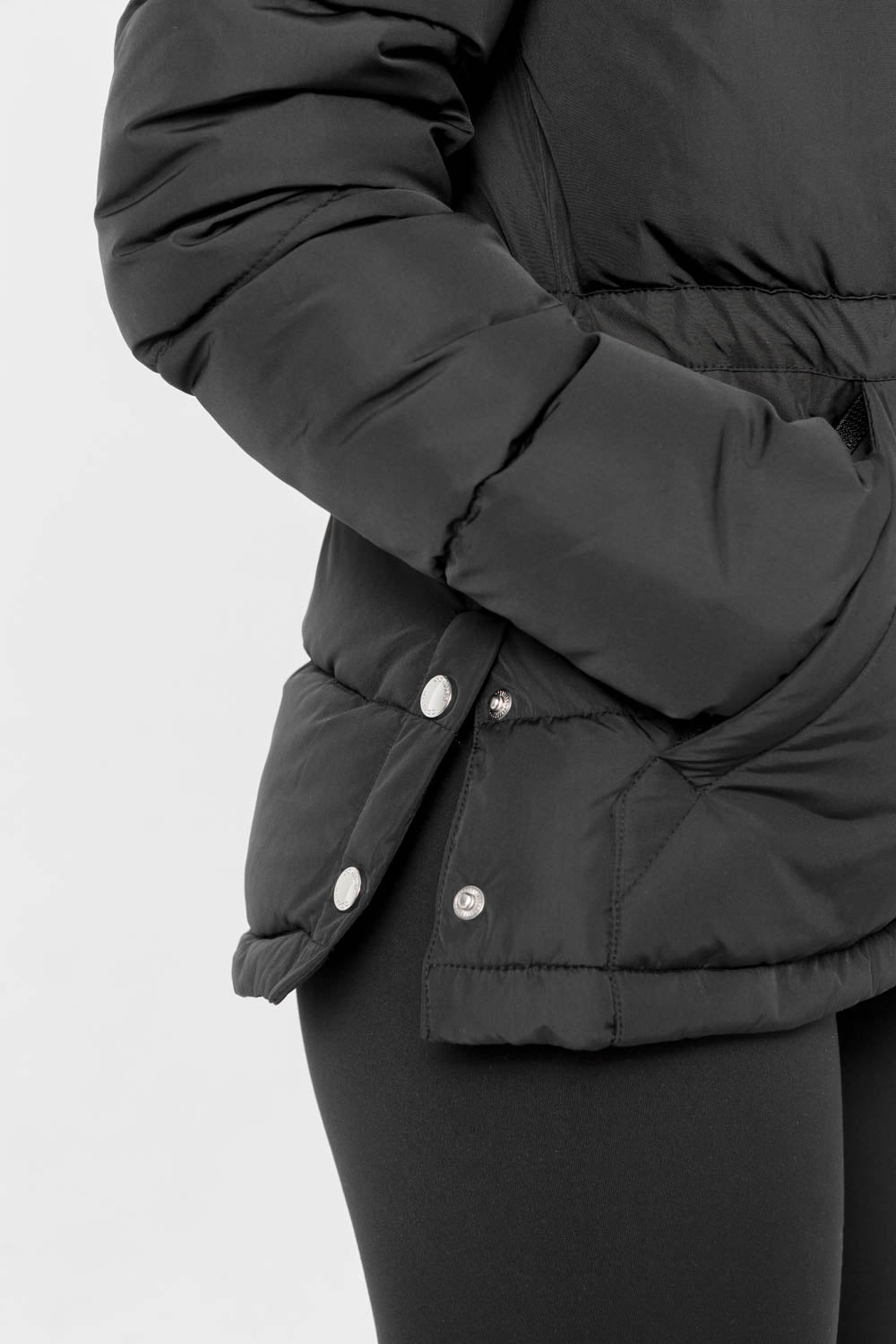 Black padded jacket side buttons